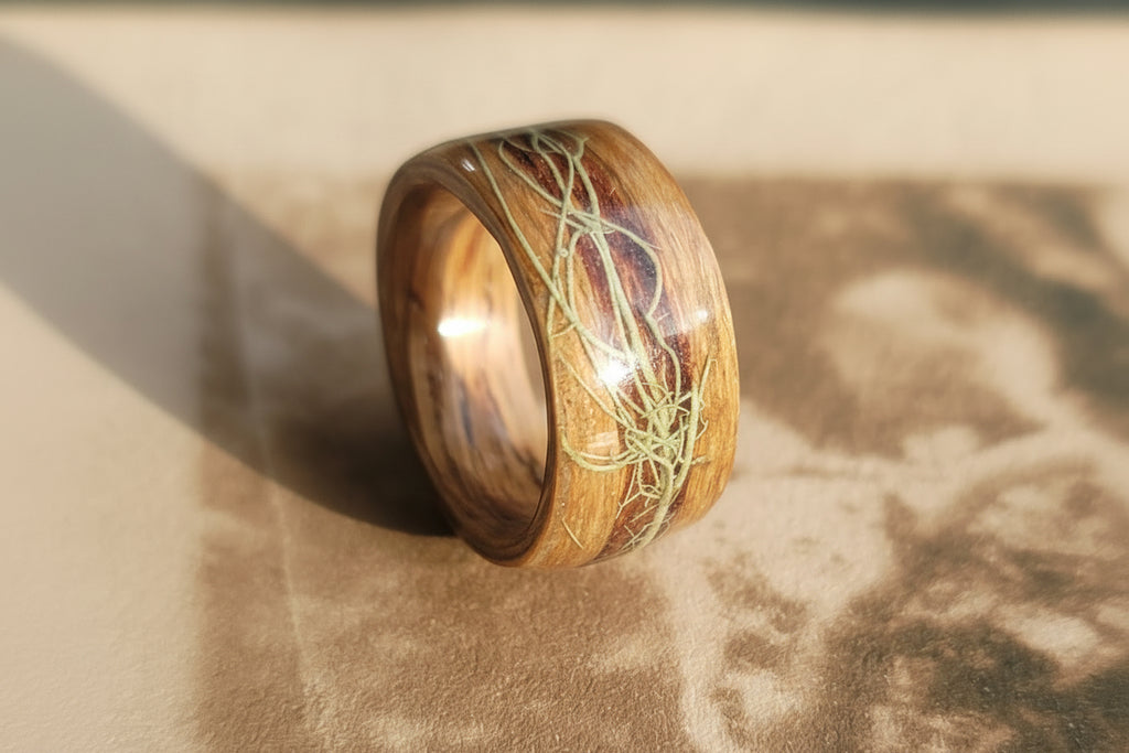 Wooden ring with natural design on a textured surface